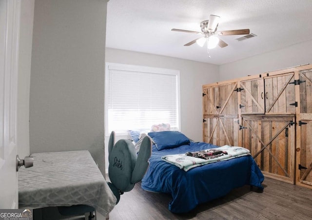 435 Goss Rd, Epworth, GA 30541 - bedroom with wood finished floors and ceiling fan