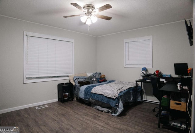 435 Goss Rd, Epworth, GA 30541 - bedroom with wood finished floors, crown molding, an office area, a ceiling fan, and baseboards