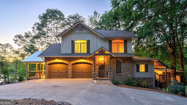 4317 Harold Whelchel Rd, Gainesville, GA 30506 - view of front of house featuring stone siding, driveway, and board and batten siding