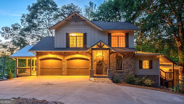 4317 Harold Whelchel Rd, Gainesville, GA 30506 - view of front facade featuring stone siding, concrete driveway, board and batten siding, and a shingled roof