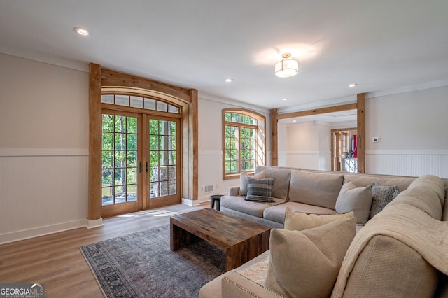 4317 Harold Whelchel Rd, Gainesville, GA 30506 - living room featuring wainscoting, wood finished floors, french doors, recessed lighting, and ornamental molding