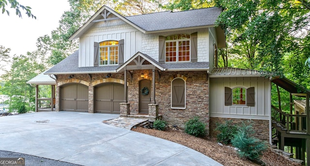 4317 Harold Whelchel Rd, Gainesville, GA 30506 - view of front facade with stone siding, board and batten siding, driveway, and roof with shingles