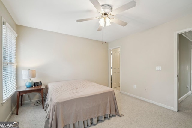 2871 Trailing Ivy Way, Buford, GA 30519 - bedroom with multiple windows, light colored carpet, and ceiling fan
