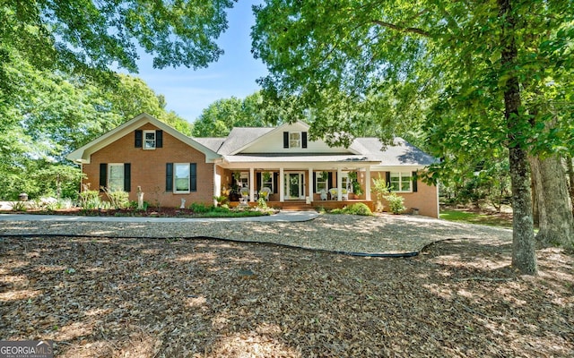 401 Riverwalk, Mcdonough, GA 30252 - view of front of house with a porch and brick siding