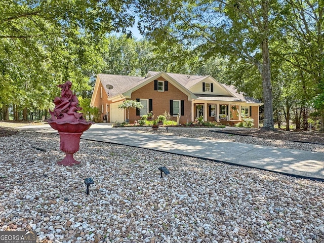 401 Riverwalk, Mcdonough, GA 30252 - view of front facade featuring brick siding and concrete driveway