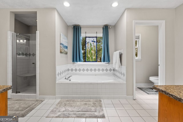 401 Riverwalk, Mcdonough, GA 30252 - bathroom with vanity, a bath, toilet, a shower stall, and tile patterned flooring