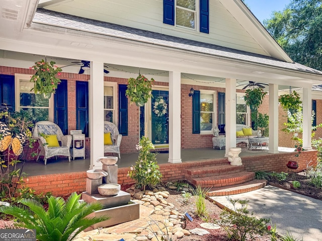 401 Riverwalk, Mcdonough, GA 30252 - property entrance featuring a porch, ceiling fan, and brick siding