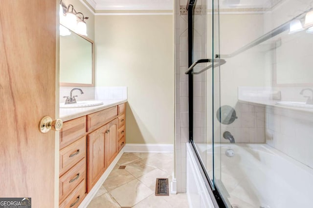 2211 Jonathan Ave, Lithonia, GA 30058 - bathroom with crown molding, vanity, and enclosed tub / shower combo