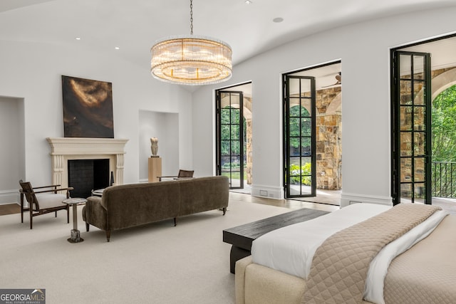 4560 Harris Trl, Atlanta, GA 30327 - bedroom with access to exterior, a chandelier, a fireplace, and carpet floors