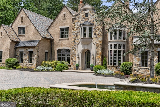 4560 Harris Trl, Atlanta, GA 30327 - view of front facade featuring a chimney