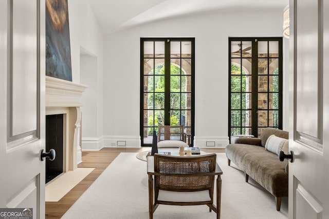 4560 Harris Trl, Atlanta, GA 30327 - doorway to outside with lofted ceiling, wood finished floors, and french doors