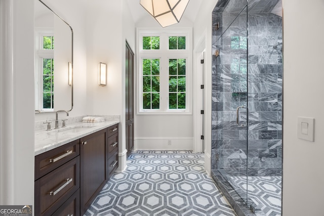 4560 Harris Trl, Atlanta, GA 30327 - bathroom with vanity, plenty of natural light, and a stall shower