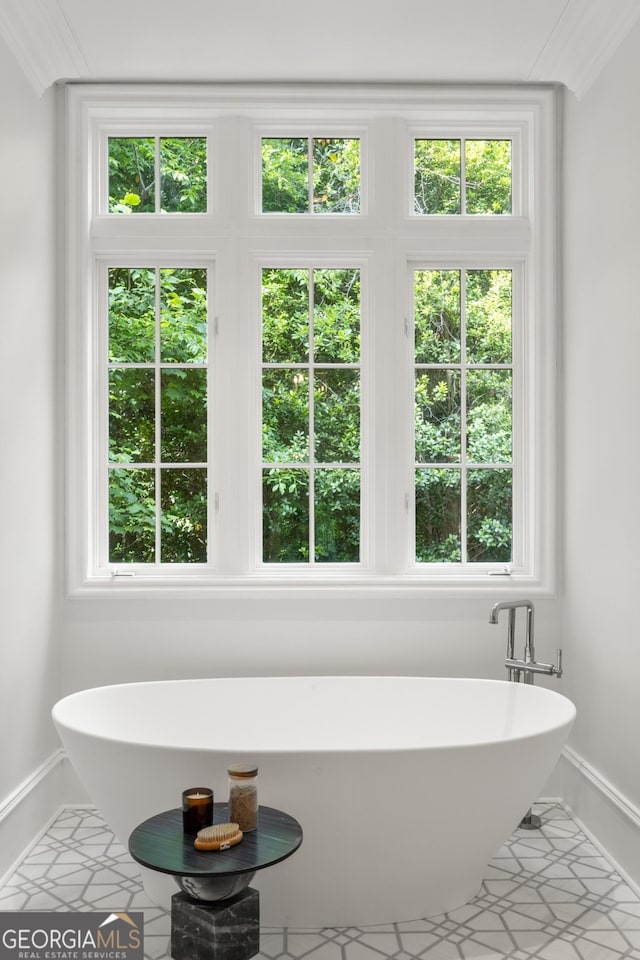 4560 Harris Trl, Atlanta, GA 30327 - bathroom featuring a freestanding bath and baseboards