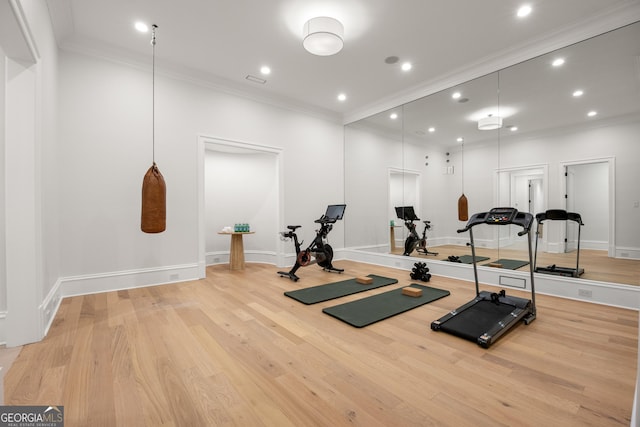 4560 Harris Trl, Atlanta, GA 30327 - exercise area with light wood-style floors, crown molding, recessed lighting, and baseboards