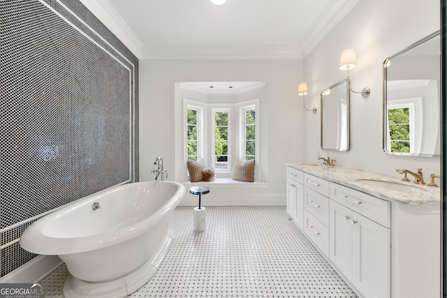 4560 Harris Trl, Atlanta, GA 30327 - bathroom with a freestanding bath, double vanity, crown molding, and tile patterned floors