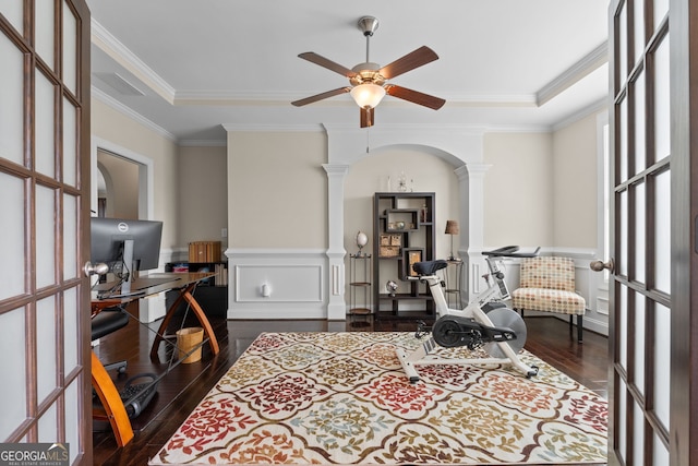 1516 Winward Dr, Locust Grove, GA 30248 - sitting room with decorative columns, dark wood-style floors, ceiling fan, a wainscoted wall, and crown molding