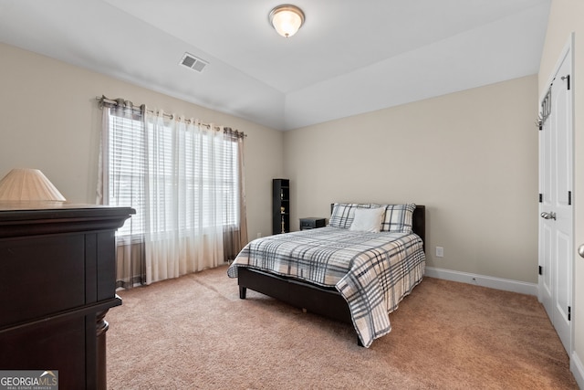 1516 Winward Dr, Locust Grove, GA 30248 - bedroom featuring light colored carpet, baseboards, and vaulted ceiling