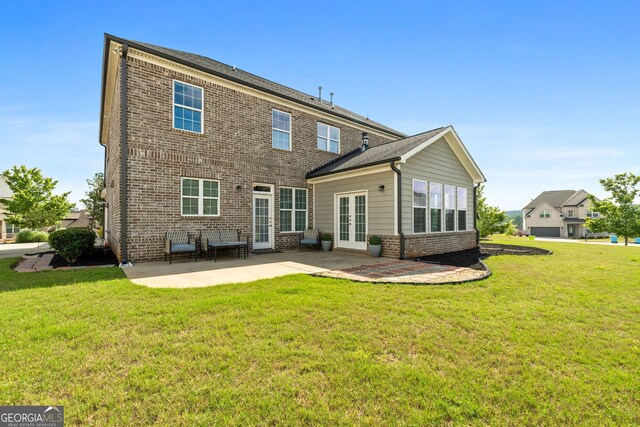 1516 Winward Dr, Locust Grove, GA 30248 - rear view of property with french doors, brick siding, a patio area, and a yard