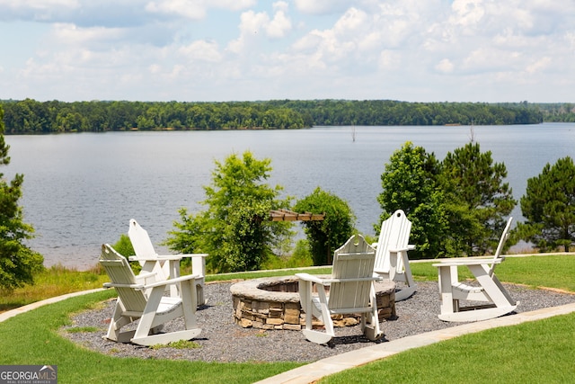 1516 Winward Dr, Locust Grove, GA 30248 - view of patio featuring a fire pit, a water view, and a forest view