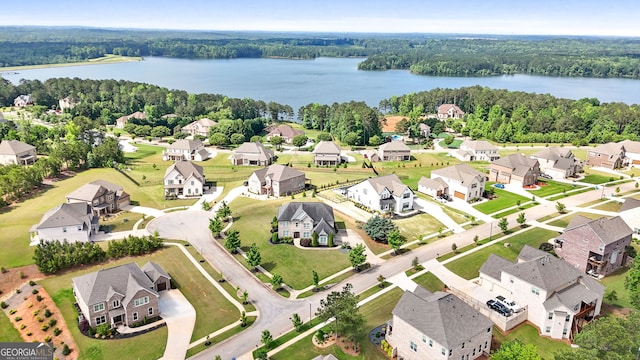 1516 Winward Dr, Locust Grove, GA 30248 - aerial view of residential area with a large body of water and a forest