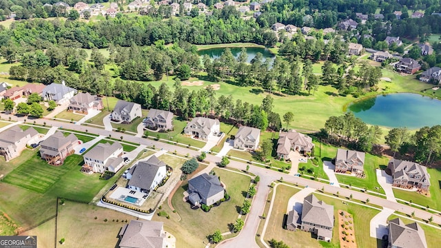 1516 Winward Dr, Locust Grove, GA 30248 - aerial view of property and surrounding area featuring nearby suburban area, a nearby body of water, a tree filled landscape, and a golf club