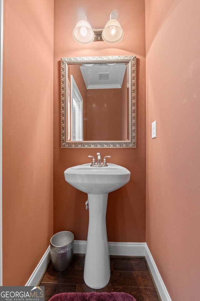 1516 Winward Dr, Locust Grove, GA 30248 - bathroom featuring baseboards and wood finished floors