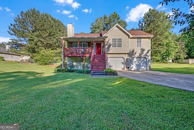 2006 Carrollton Hwy, Temple, GA 30179 - split level home featuring a porch, stairway, an attached garage, concrete driveway, and a chimney