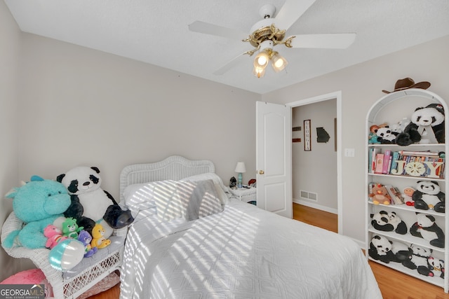 2006 Carrollton Hwy, Temple, GA 30179 - bedroom with wood finished floors and ceiling fan