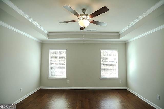 2304 Shetley Creek Dr, Norcross, GA 30071 - spare room featuring a raised ceiling, a ceiling fan, dark wood-style flooring, ornamental molding, and baseboards