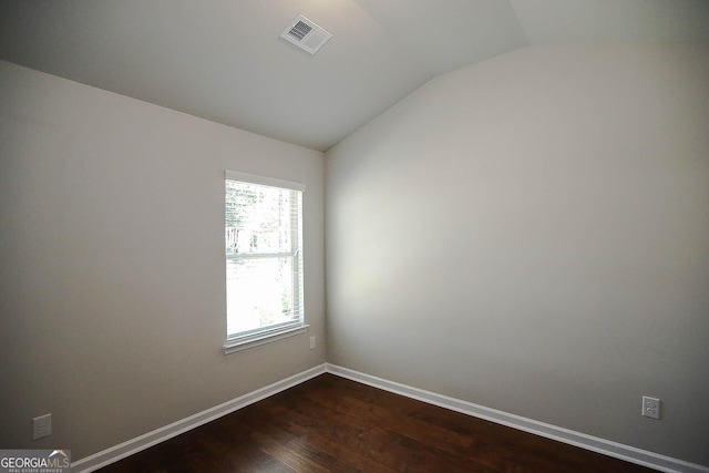 2304 Shetley Creek Dr, Norcross, GA 30071 - unfurnished room featuring vaulted ceiling, dark wood-type flooring, and baseboards