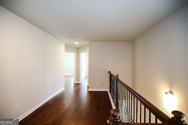 2304 Shetley Creek Dr, Norcross, GA 30071 - hallway with dark wood-style floors, an upstairs landing, and baseboards