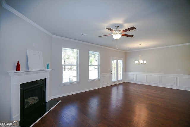 2304 Shetley Creek Dr, Norcross, GA 30071 - unfurnished living room featuring ceiling fan, a chandelier, a fireplace with raised hearth, dark wood-style floors, and ornamental molding