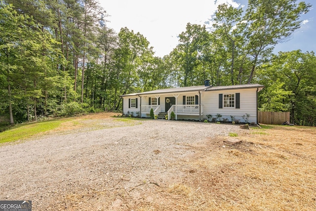 130 April Trce, Dawsonville, GA 30534 - manufactured / mobile home featuring covered porch and gravel driveway