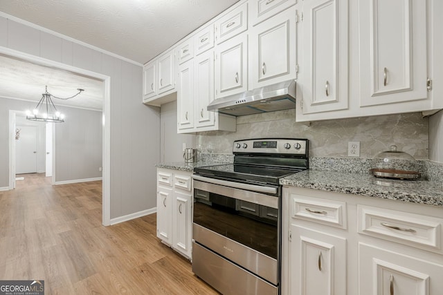 130 April Trce, Dawsonville, GA 30534 - kitchen featuring electric stove, under cabinet range hood, ornamental molding, backsplash, and a chandelier