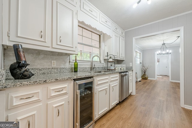 130 April Trce, Dawsonville, GA 30534 - kitchen featuring wine cooler, dishwasher, a sink, ornamental molding, and decorative backsplash