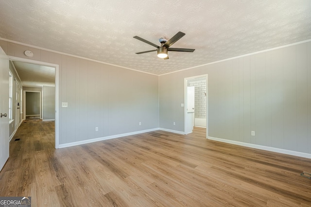 130 April Trce, Dawsonville, GA 30534 - unfurnished room with ceiling fan, wood finished floors, a textured ceiling, baseboards, and a smoke detector