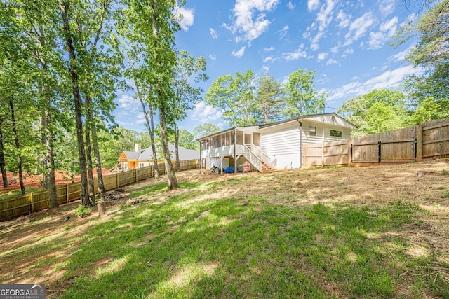 130 April Trce, Dawsonville, GA 30534 - view of yard featuring a sunroom, stairs, and a gate