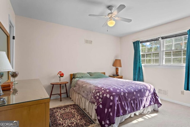 8415 Ridge Rd, Fairburn, GA 30213 - carpeted bedroom with baseboards and a ceiling fan