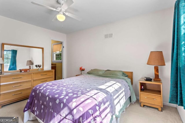 8415 Ridge Rd, Fairburn, GA 30213 - bedroom with light colored carpet and a ceiling fan