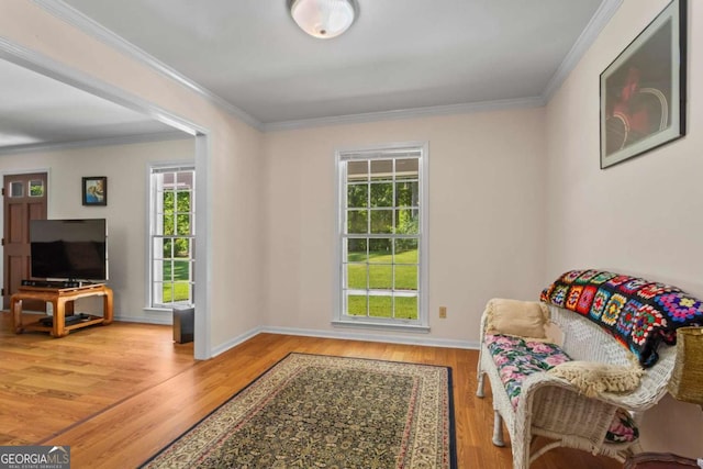 8415 Ridge Rd, Fairburn, GA 30213 - sitting room featuring crown molding, wood finished floors, and baseboards
