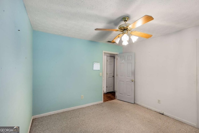 2617 Laurel Woods Ln SE, Conyers, GA 30094 - unfurnished bedroom featuring carpet floors, baseboards, a textured ceiling, and ceiling fan