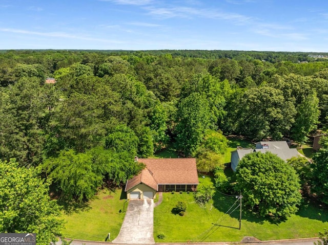 2617 Laurel Woods Ln SE, Conyers, GA 30094 - view of subject property with a forest