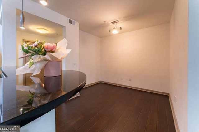 390 17th St NW Unit 2040, Atlanta, GA 30363 - spare room with dark wood-type flooring and baseboards