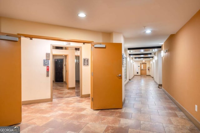 390 17th St NW Unit 2040, Atlanta, GA 30363 - corridor with baseboards and recessed lighting