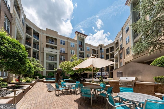 390 17th St NW Unit 2040, Atlanta, GA 30363 - view of patio / terrace with outdoor dining area and exterior kitchen