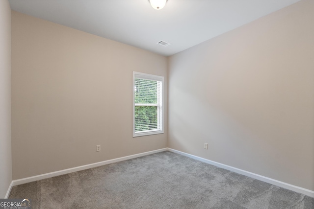 1537 Maplecliff Way, Sugar Hill, GA 30518 - carpeted empty room with baseboards