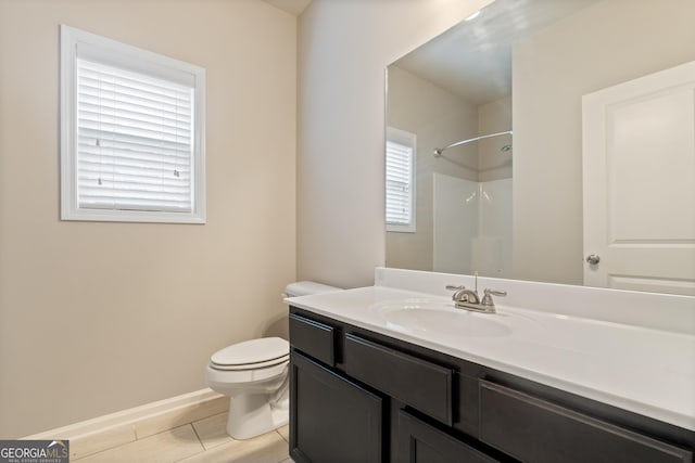 1537 Maplecliff Way, Sugar Hill, GA 30518 - full bath with toilet, vanity, a shower, and baseboards