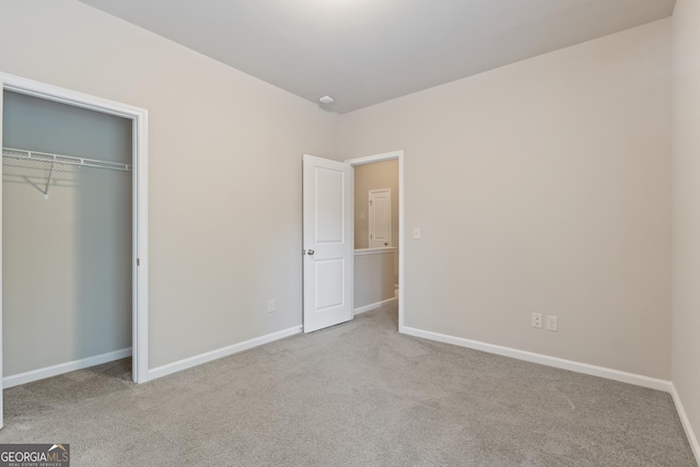 1537 Maplecliff Way, Sugar Hill, GA 30518 - unfurnished bedroom with carpet, baseboards, and a closet