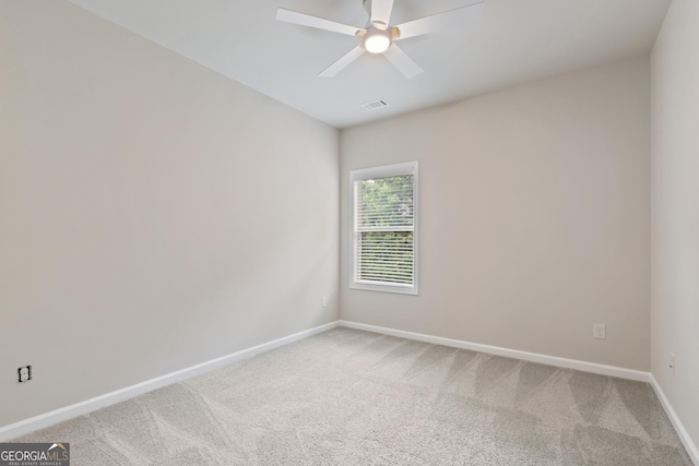 1537 Maplecliff Way, Sugar Hill, GA 30518 - unfurnished room with light colored carpet, a ceiling fan, and baseboards
