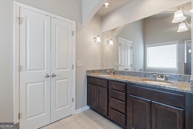 1537 Maplecliff Way, Sugar Hill, GA 30518 - full bath with double vanity and baseboards